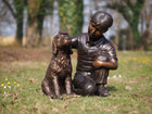 Bronzen beeld Jongen met hond 57x40x45cm
