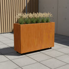 Langwerpige cortenstalen plantenbak met wielen 120x40x80 cm